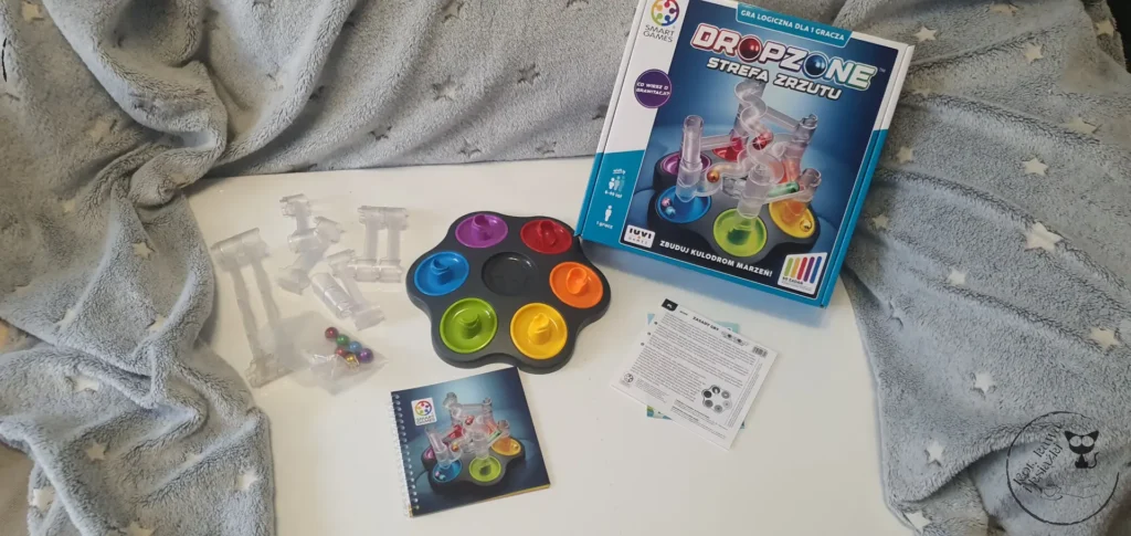 Smart Games Dropzone - Strefa zrzutu - gra logiczna od IUVI - Kot, kawa i książki